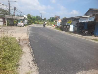 Foto : Kondisi jalan Tigaraksa-Cikuya yang sebelumnya berlubang dan bergelombang kini telah mulus (Doc. Anwar)