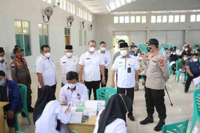 SEKDA Hadiri Acara Vaksinasi Massal Covid-19 Bersama Polres OKU dan FKUB Kabupaten OKU
